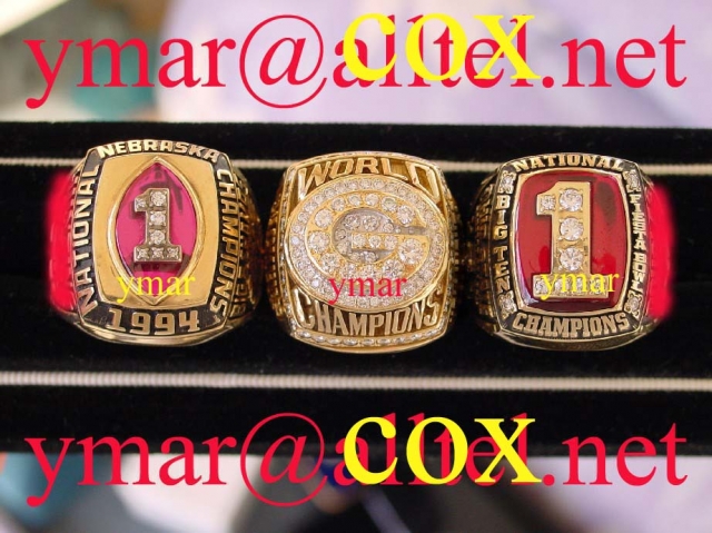 1994 Nebraska National Championship, 1996 Green Bay World Championship, and 2002 Ohio State National Championship Rings